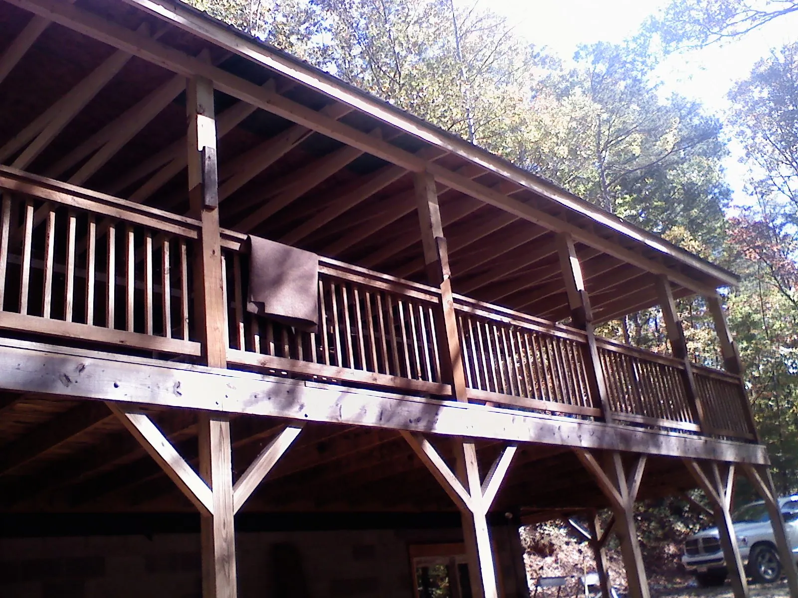 Timber framing under a new elevated porch and deck — Roof Leak Repair in Drewryville by Roofing Brothers